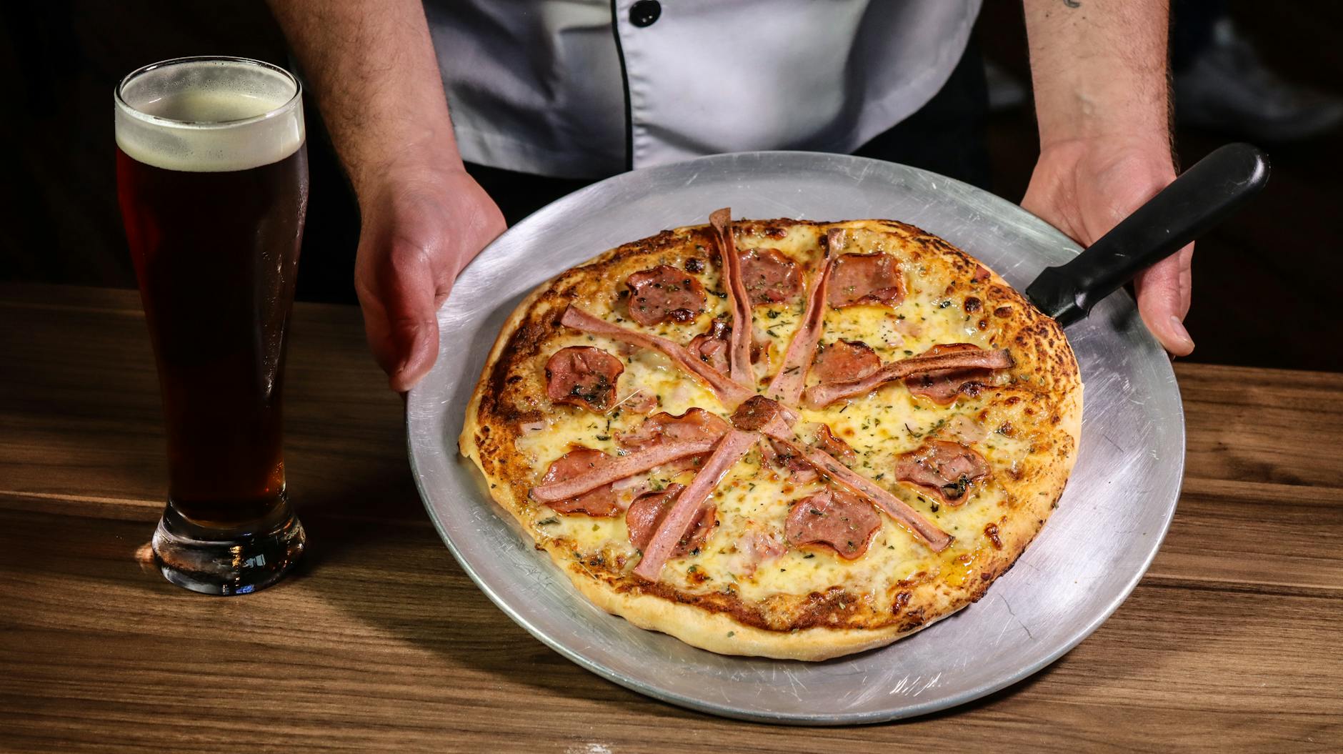 Craft beer paired with pizza at a Miami brewery