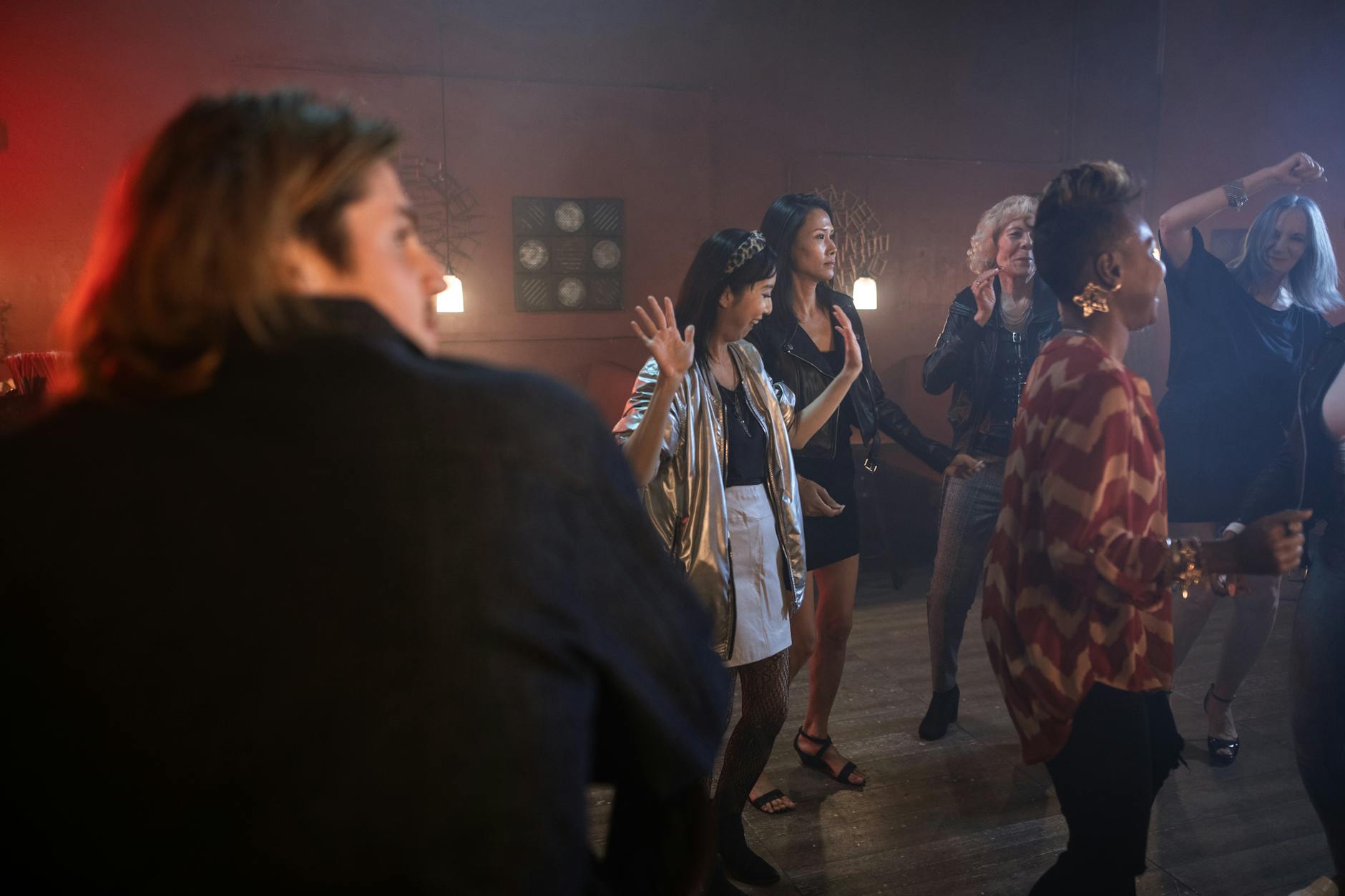 Packed dance floor at a Miami nightclub after midnight