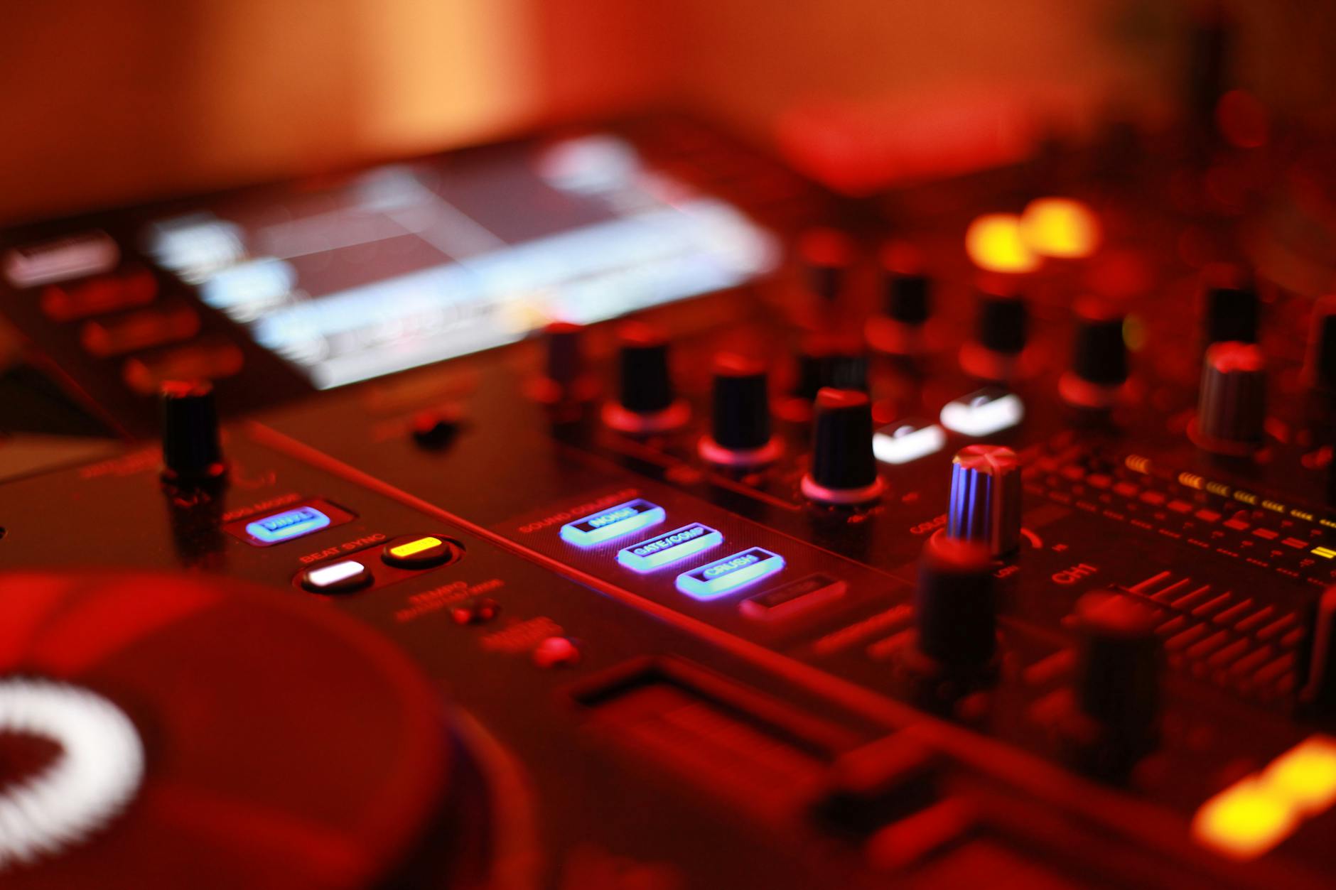 DJ performing to a full dance floor inside a Miami nightclub