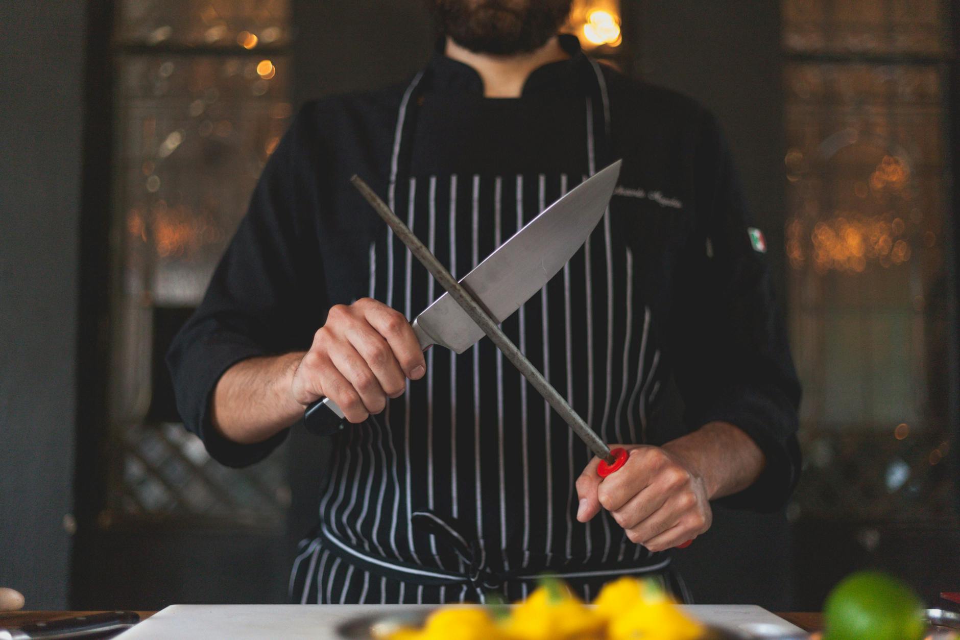 Chef preparing fresh Florida seafood at a Miami restaurant