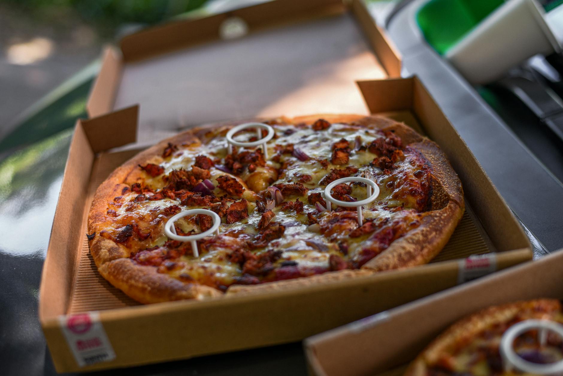 Wood-fired pizza counter at a Miami food hall