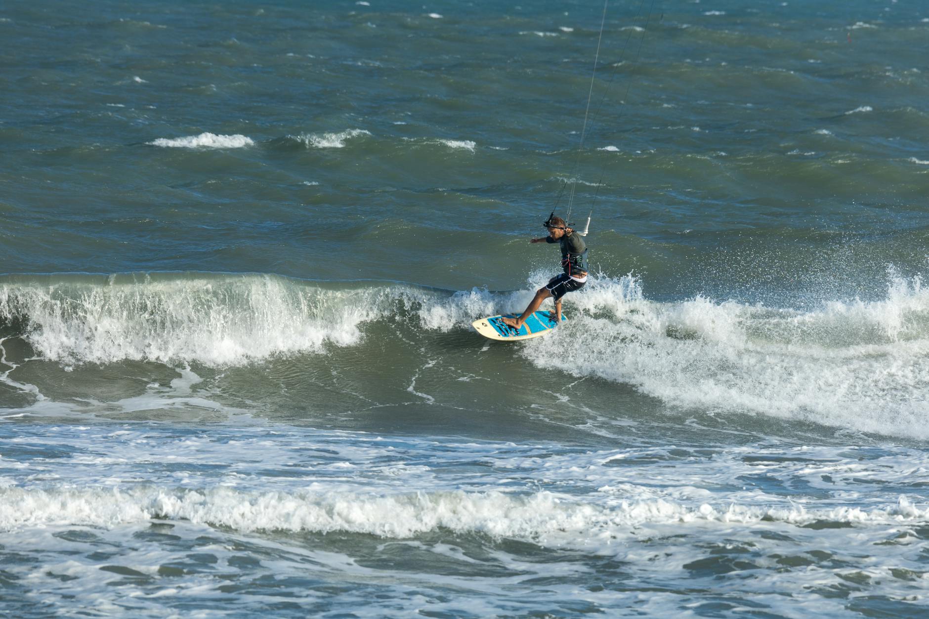 Kitesurfer riding waves at Crandon Park in Miami