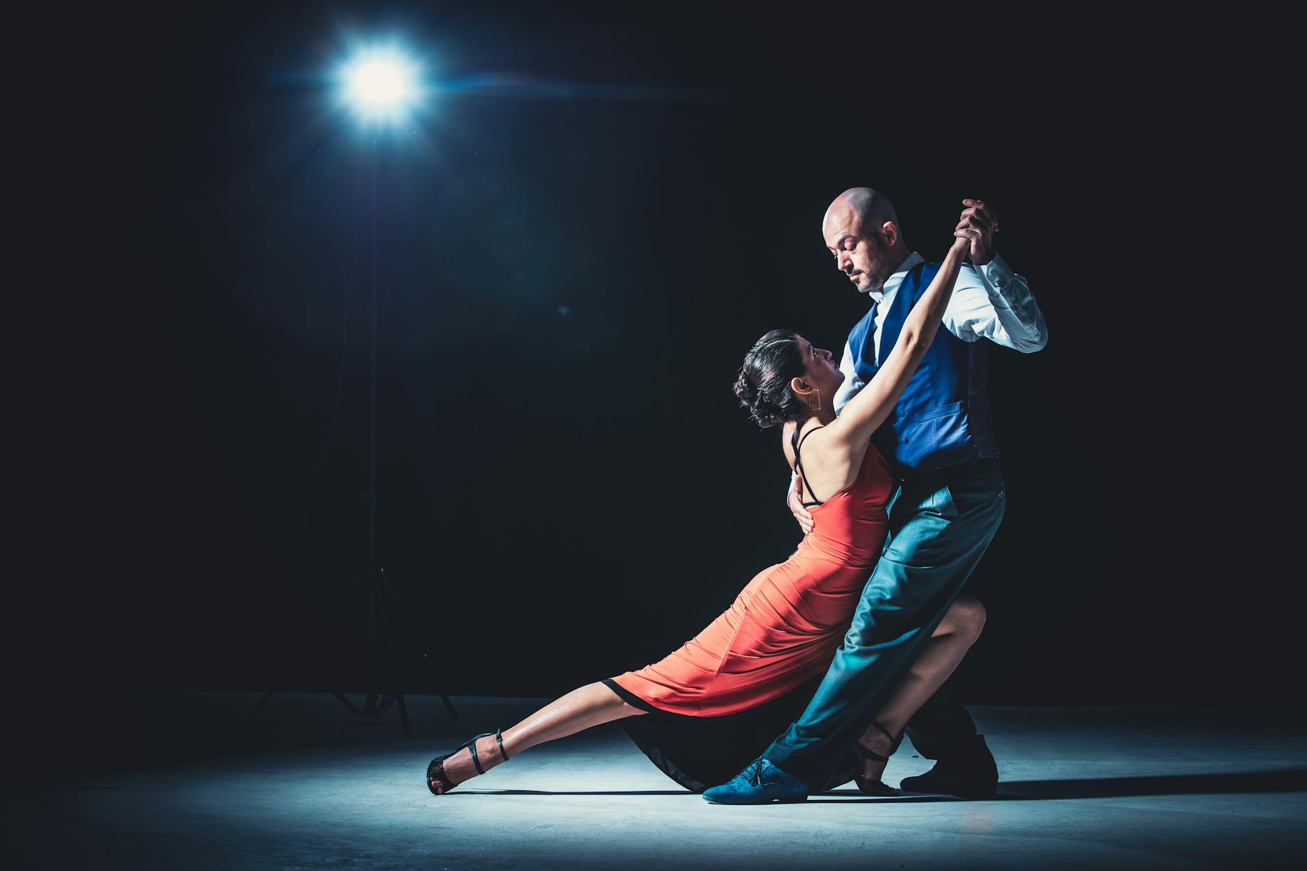 Couple salsa dancing at a Little Havana dinner venue