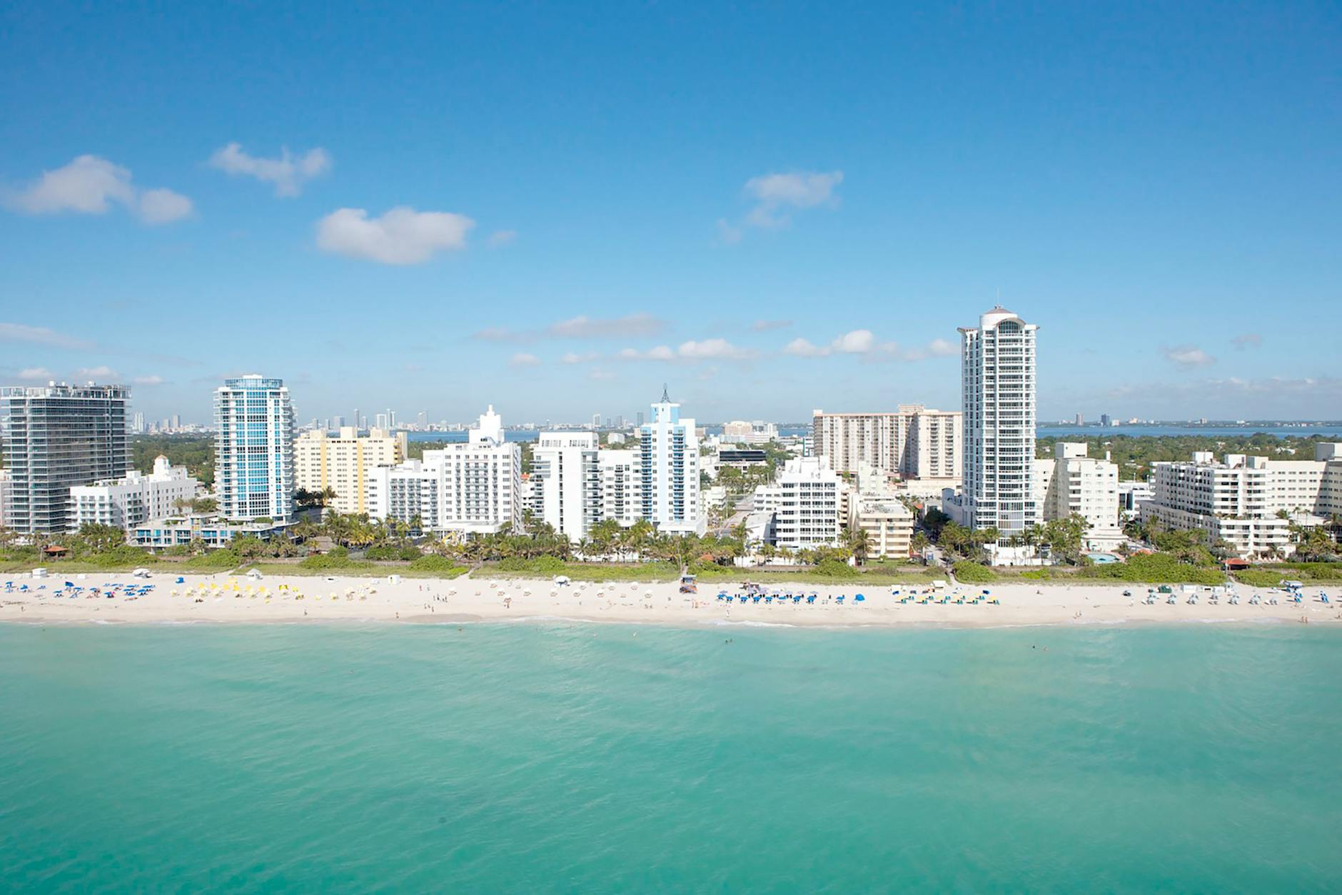 Things to do in Miami — aerial view of Miami Beach coastline with turquoise waters and white sand