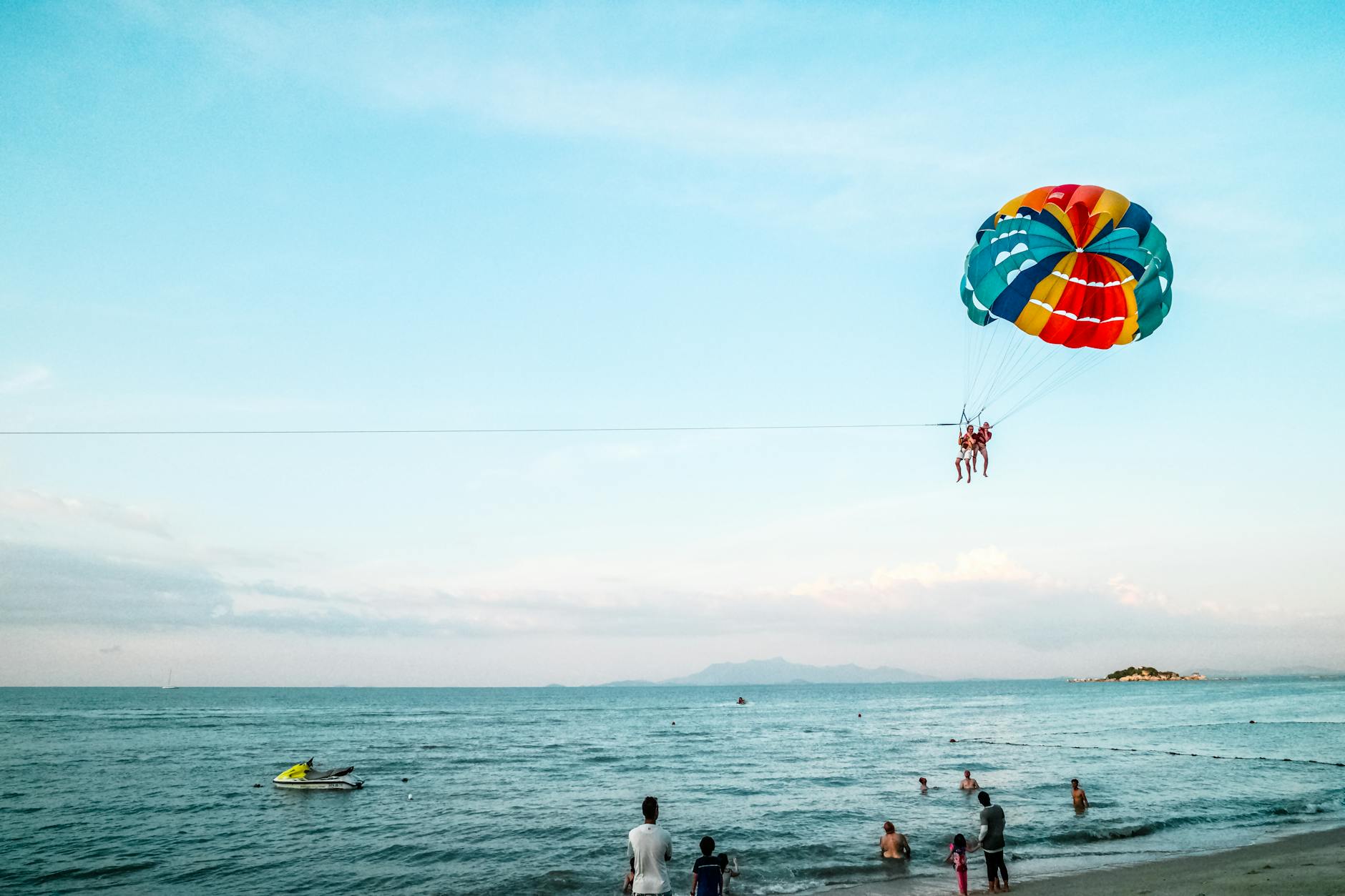 Parasailing over the turquoise water off Miami Beach