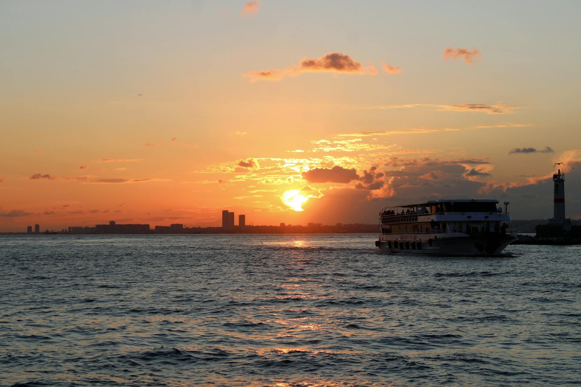 Sunset cruise sailing into a Miami orange sky