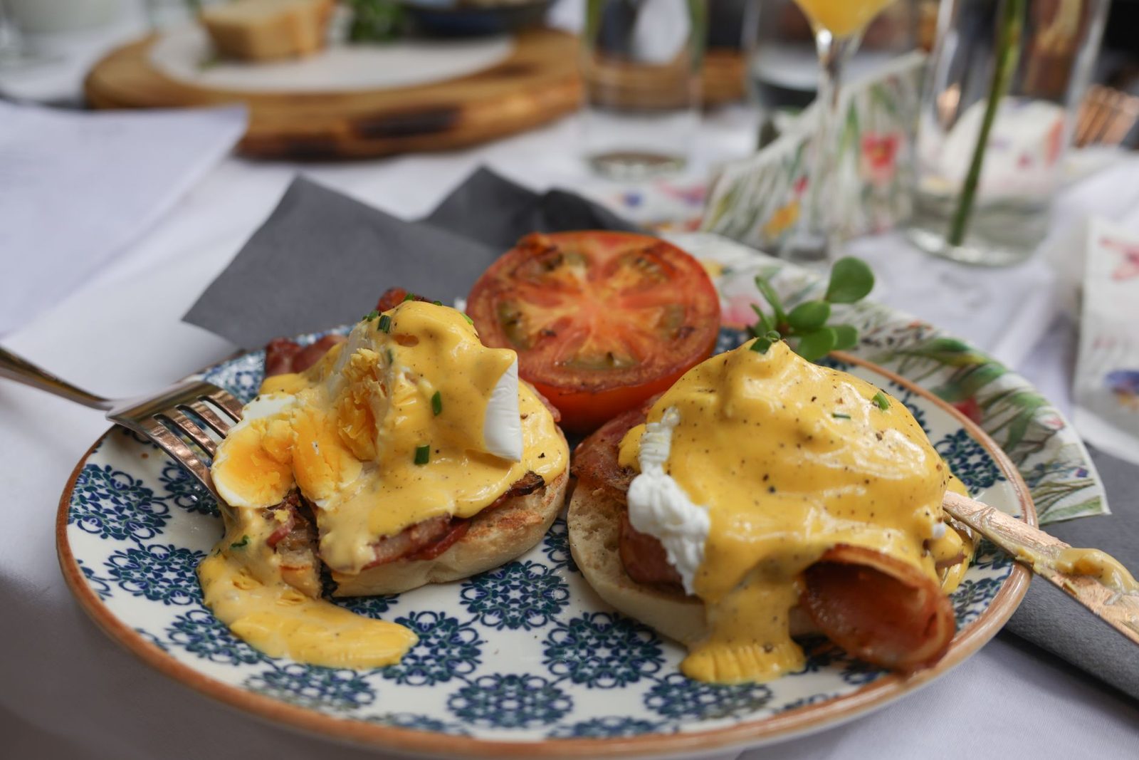 miami brunch table with eggs benedict