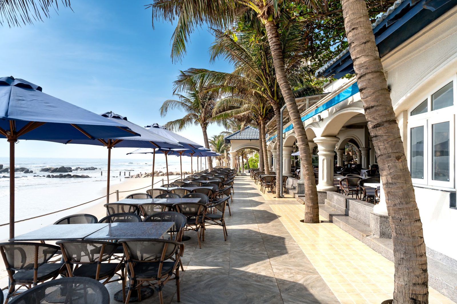 tropical restaurant patio set for brunch