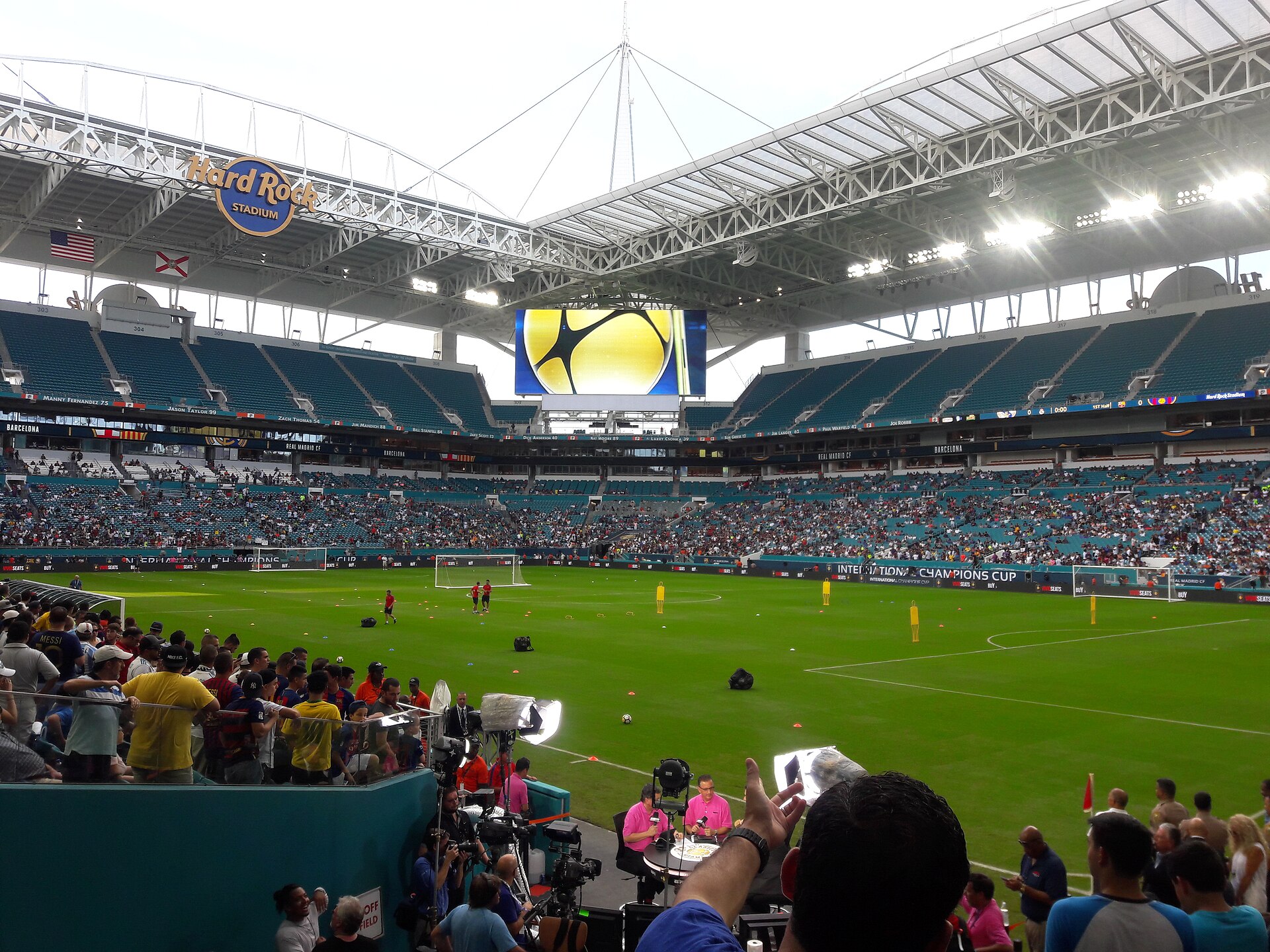 The lower bowl and teal seats of Hard Rock Stadium under the canopy before an International Champions Cup soccer match in 2017